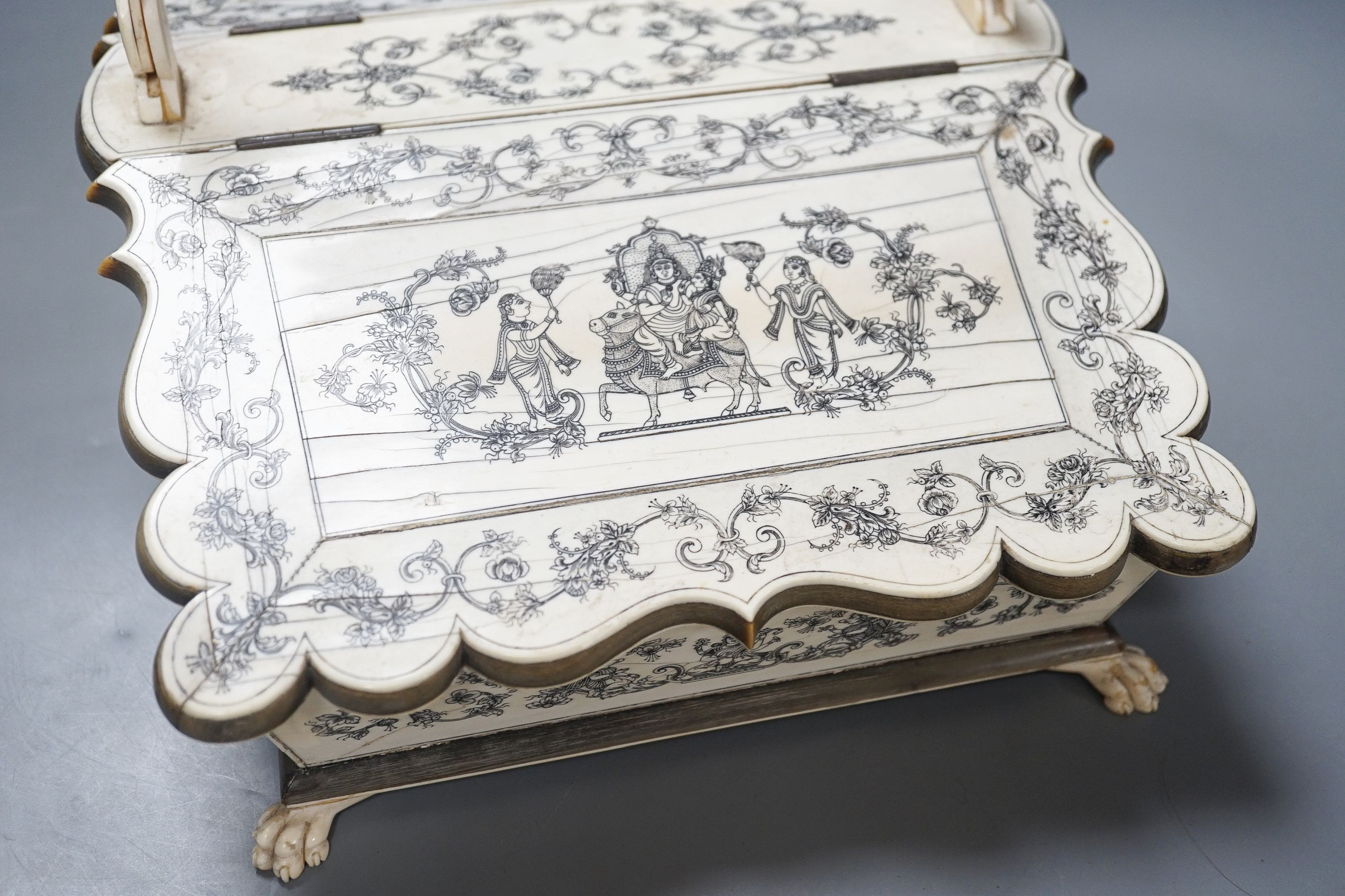 A 19th century Vizagatapatam Ivory and horn swing basket 32cm